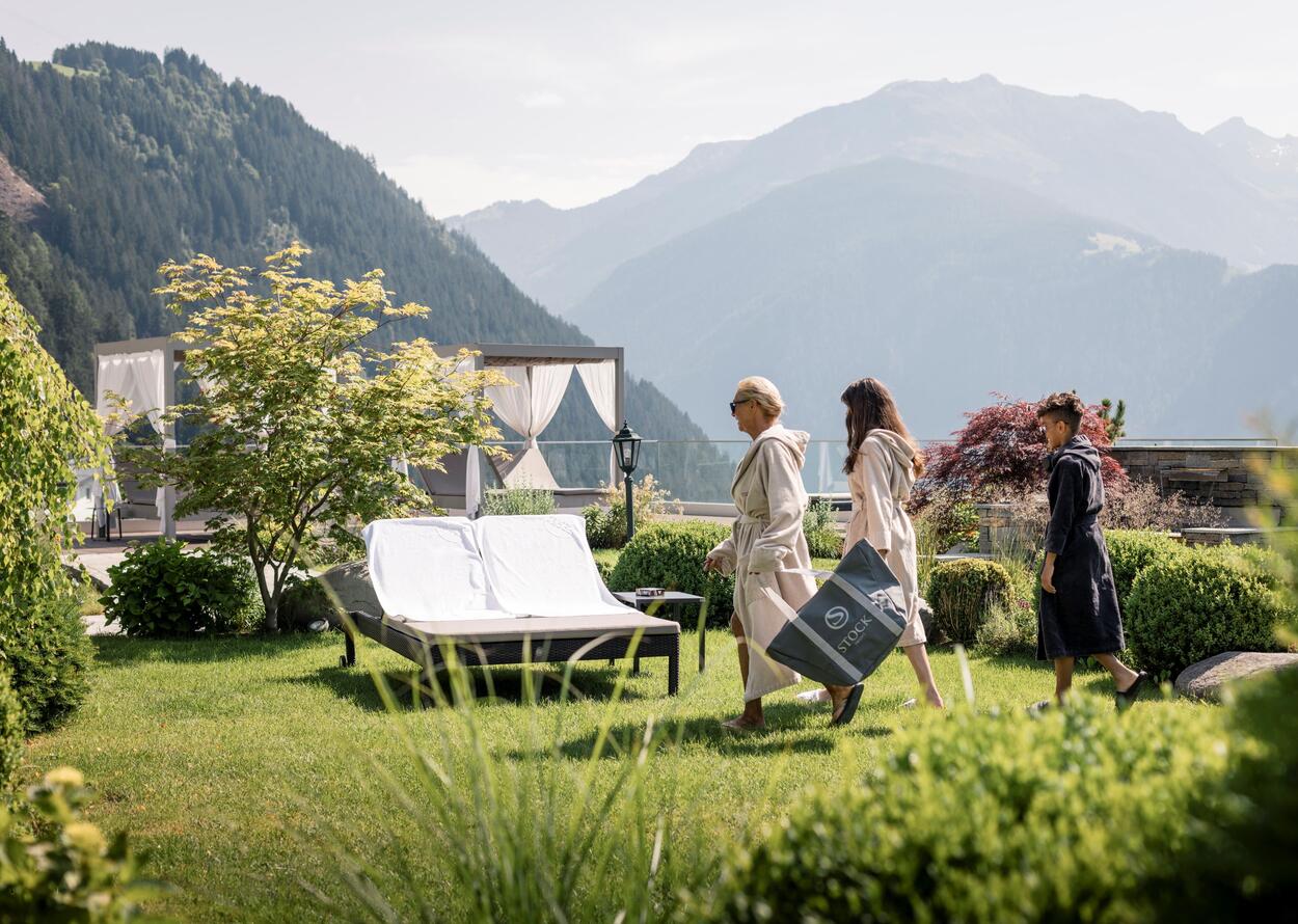 Sunbathing lawn | Best Alpine Wellness Hotel Stock, Austria