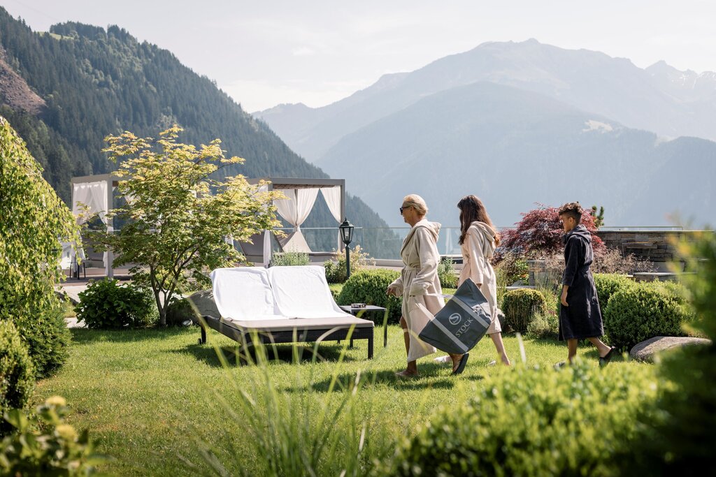 Sunbathing lawn | Best Alpine Wellness Hotel Stock, Austria