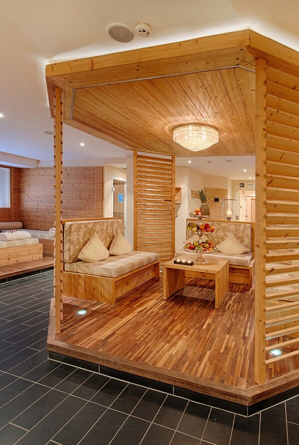 Relaxation Area with wooden Elements | Best Alpine Wellness Hotel Alpenpalace, South Tyrol
