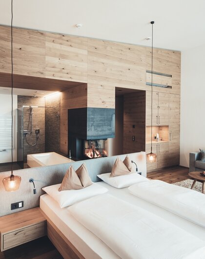 Wooden room with fireplace | Wellnesshotel Nesslerhof, Großarl