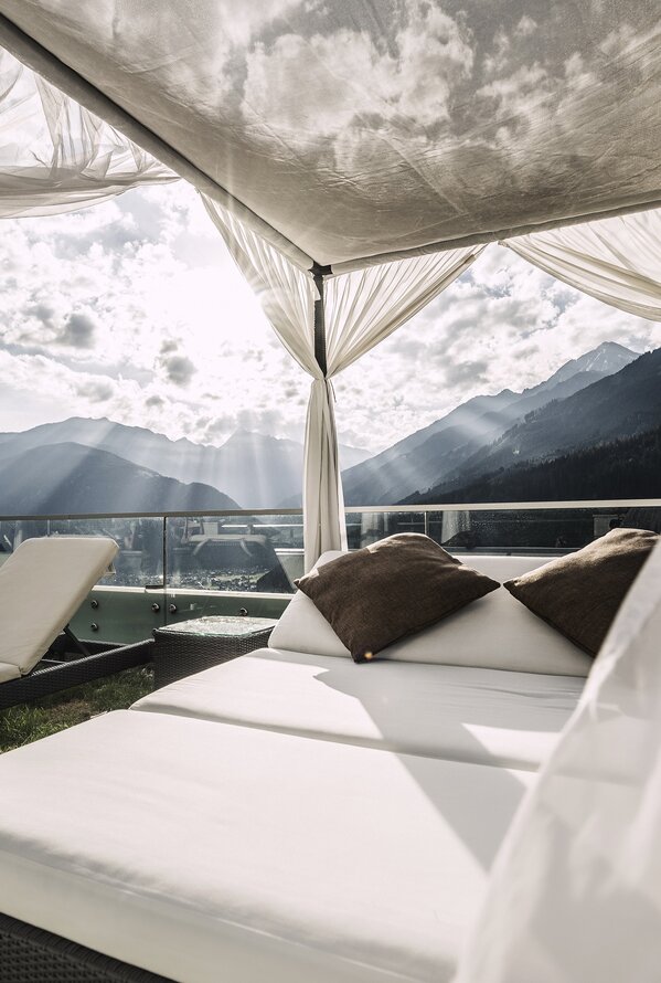 Relaxing in the Canopy Bed | Wellnesshotel Stock, 5 Star Hotel Zillertal