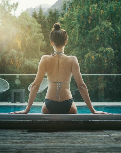 Swimming in the Outdoor Pool | Best Alpine Wellnesshotel Waldklause, Längenfeld