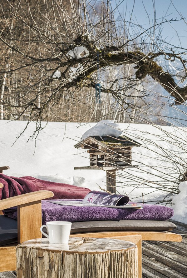 Lounger in the winter landscape | Wellnesshotel Krallerhof, Wellness vacation in Leogang