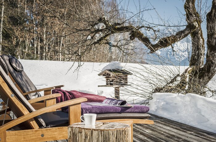 Lounger in the winter landscape | Wellnesshotel Krallerhof, Wellness vacation in Leogang