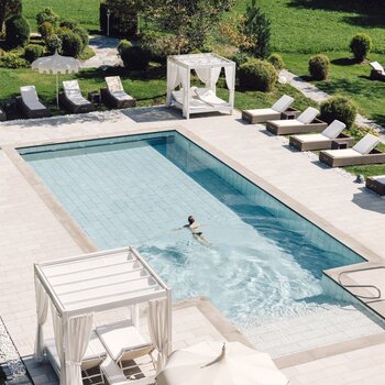 Outside pool birds eye view | Wellnesshotel Alpenpalace, South Tyrol