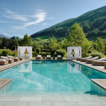 Outdoor Pool with Garden | Luxury Hideaway & Spa Retreat Alpenpalace, Wellnesshotel South Tyrol