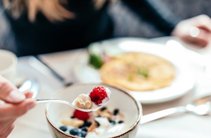 A fresh breakfast with berries and yogurt.