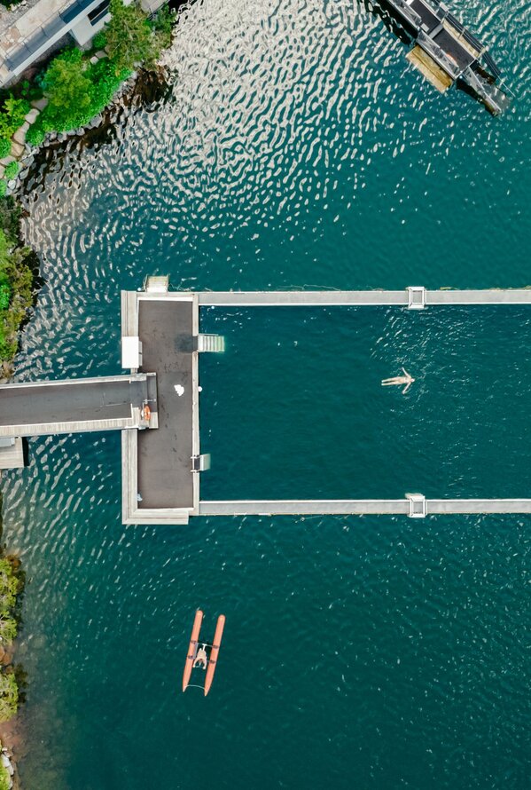 An impressive aerial view shows the pier and the crystal-clear mountain lake of the resort.Today 5:21 PM •204 chars • 31 words