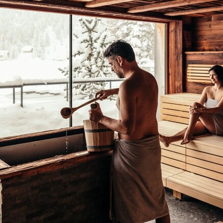 Relaxing sauna infusion with panoramic views of the snowy winter landscape