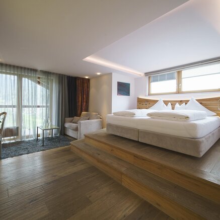 Bright double room Fürstenhof in the Hotel Krallerhof with large bed and balcony