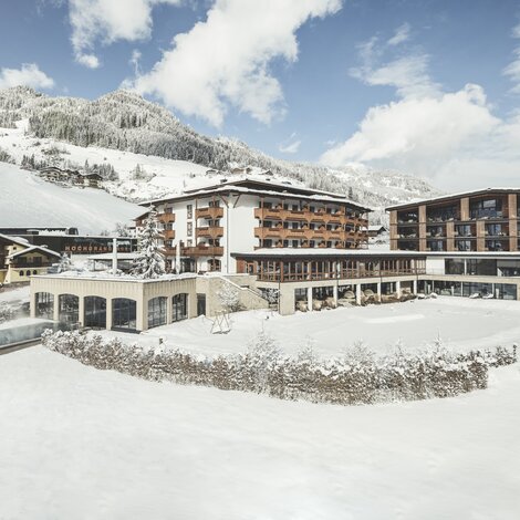 Hotel in verschneiter Winterlandschaft | 4 Sterne Superior Wellnesshotel Nesslerhof, Wellnesshotel Salzburger Land