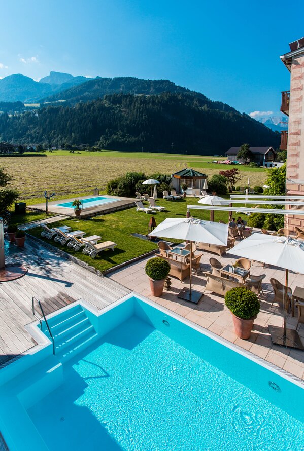 Außenansicht Garten | Wellnesshotel Theresa, Tirol