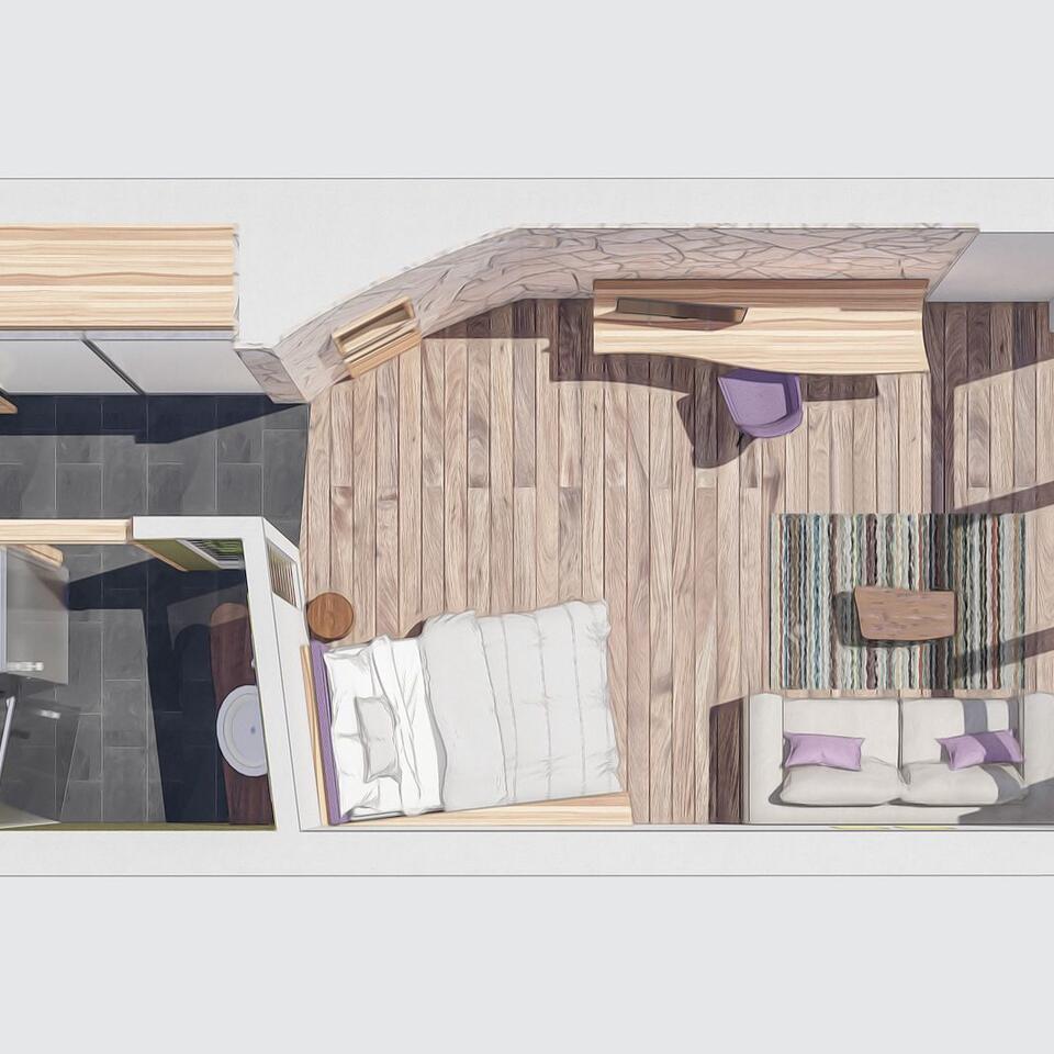 Top view of a living room with bed, sofa and wooden walls